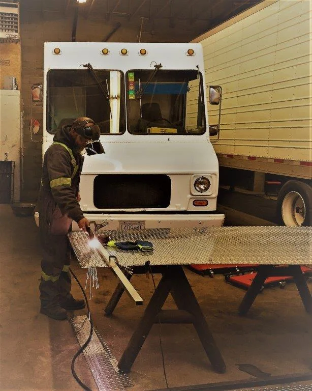 Fabricating checker plate floor.