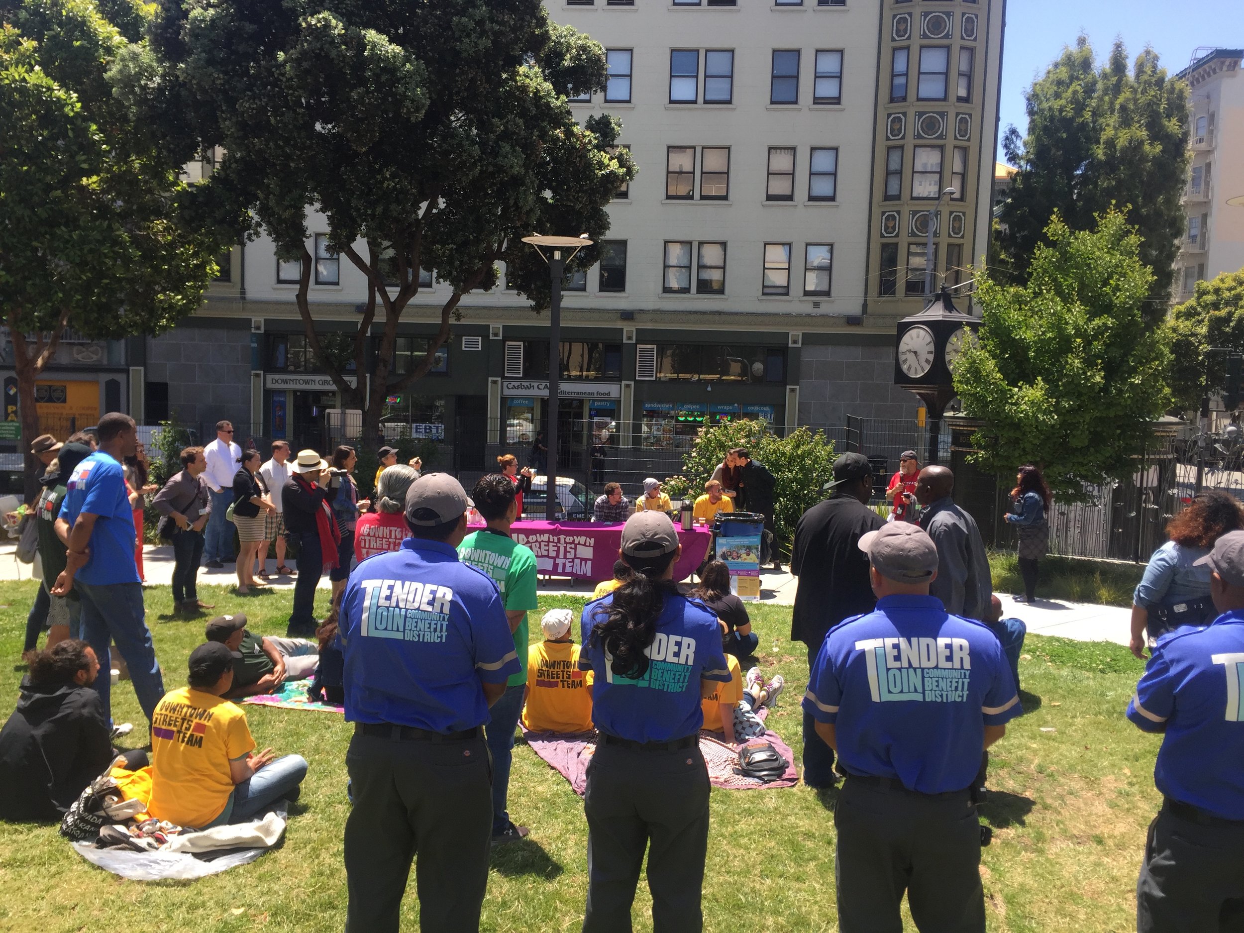 TLCBD Clean Team members from Block by Block and Downtown Streets Team (DST) welcome DST to the Tenderloin with a "Picnic in the Park" launch event in July at Boeddeker Park. 