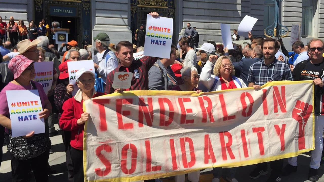 Tenderloin Solidarity Banner held by neighborhood residents and community organizers as part of the Unite Against Hate rally at City Hall on Friday, August 25th. Courtesy of ABC 7 News