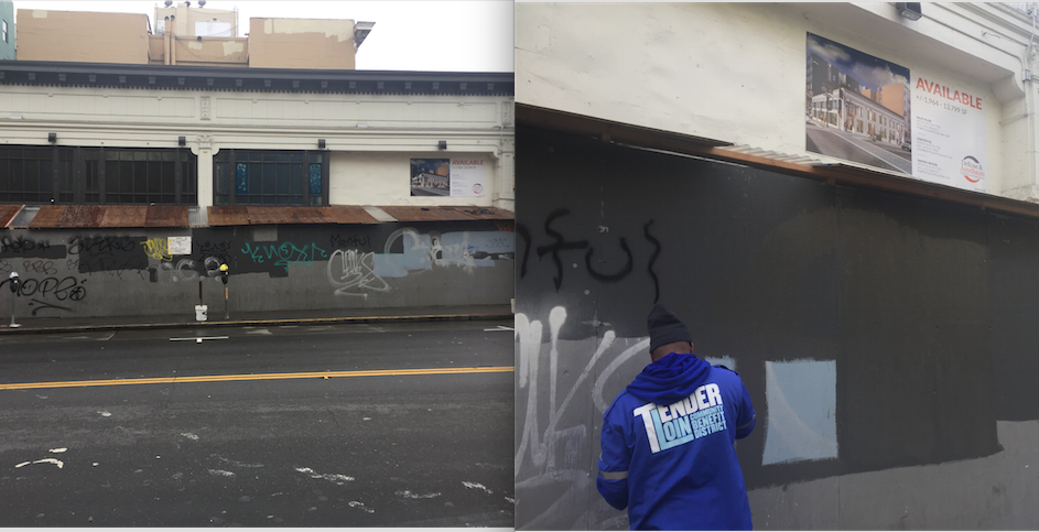 In this photo, TLCBD removes graffiti from a construction barricade.