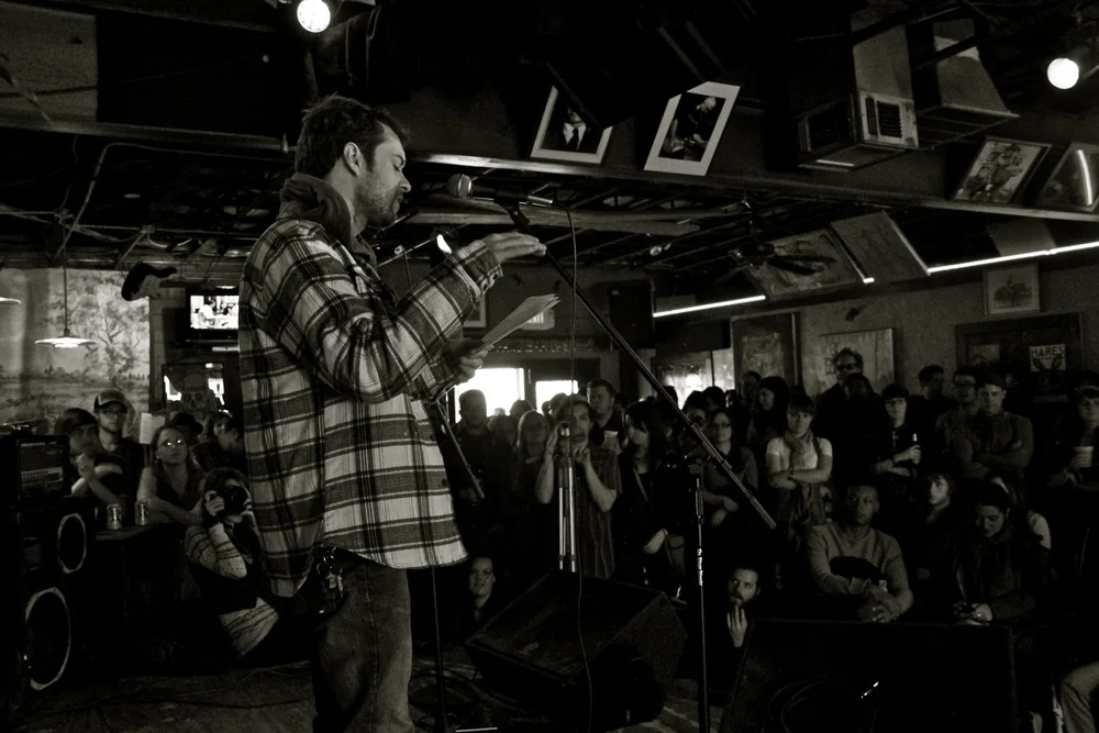 Joe Carr reading at Spiderweb Salon's first 35 Denton showcase | photo by courtney marie | 2013
