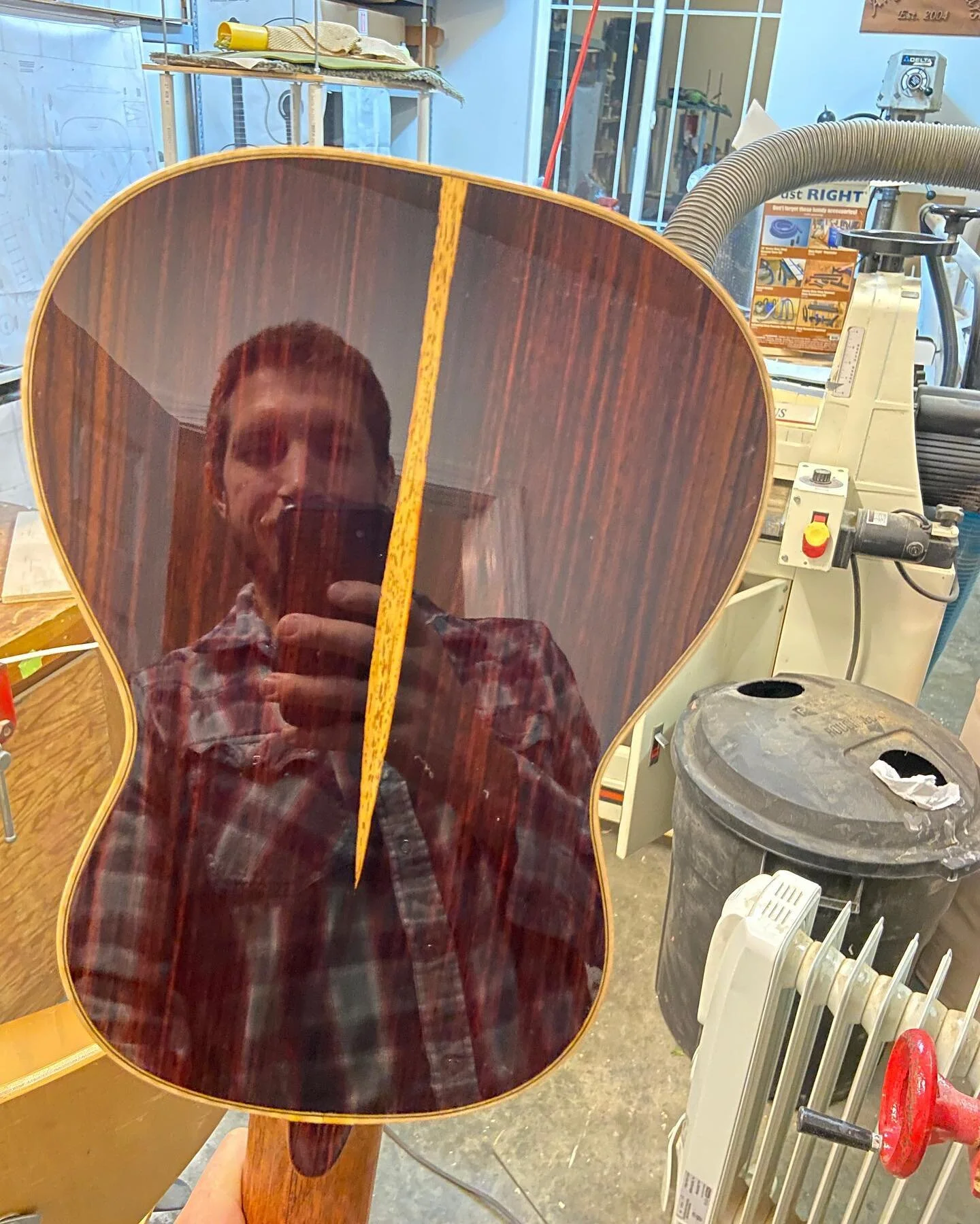 Check out that mirror finish on this cocobolo guilele!! #guitar #luthier #cocobolo
