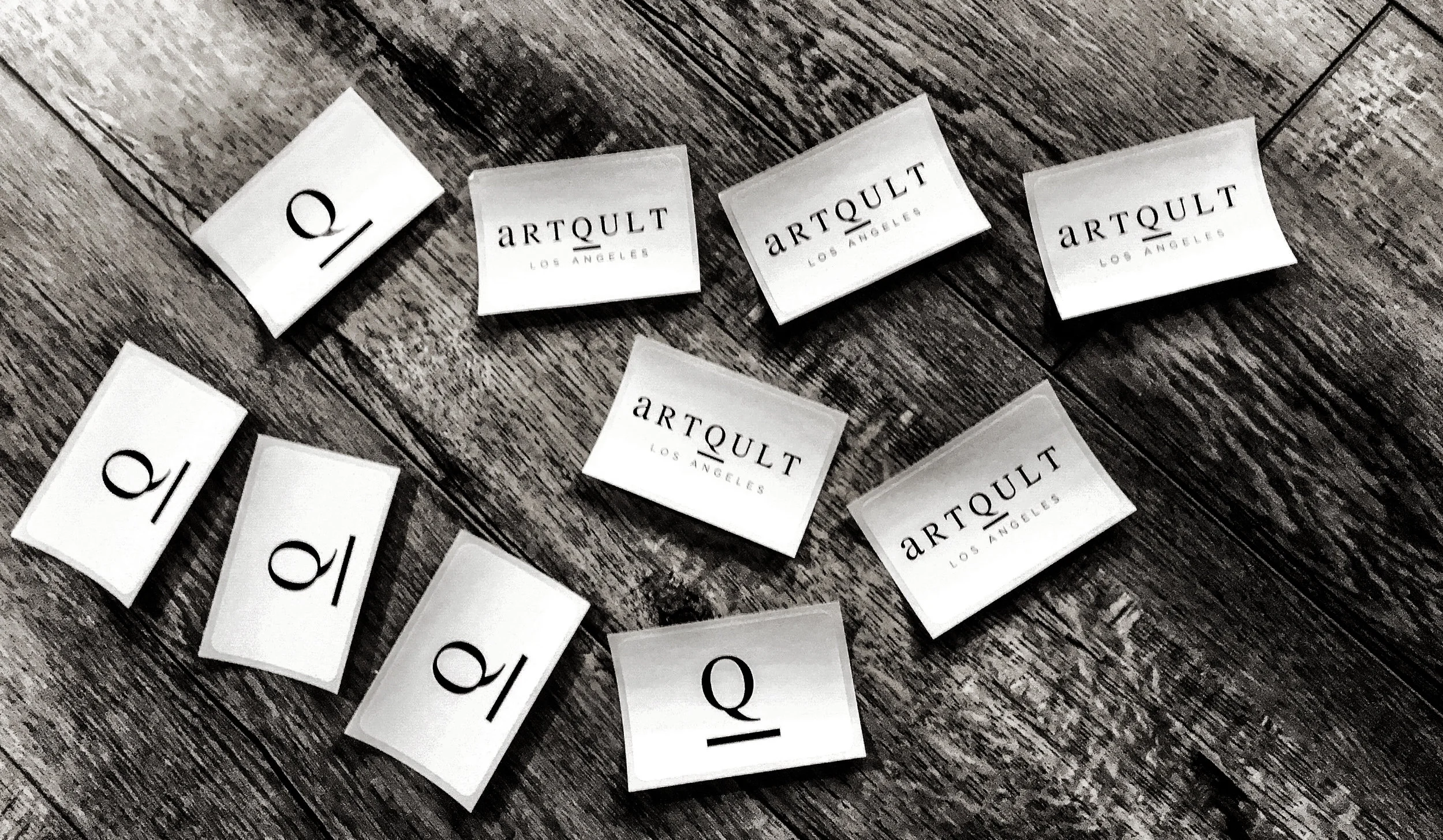 Q| AND LOGO STICKERS