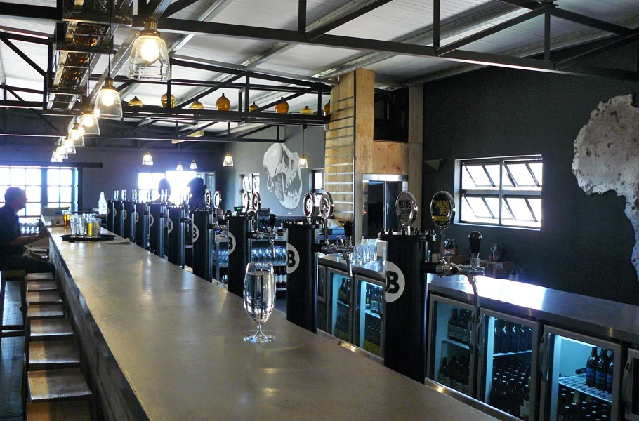 For a small farming town about an hour's drive from Cape Town, South Africa, Darling has quite a reputation. Do you know anywhere else that is simultaneously known for craft beer, an eco-friendly music festival, a wildflower show and a social activist who is best known for his performances as an old lady named Evita Bezuidenhout? From wine farms to coffee shops, here's what to do in Darling (and why you should consider a roadtrip).