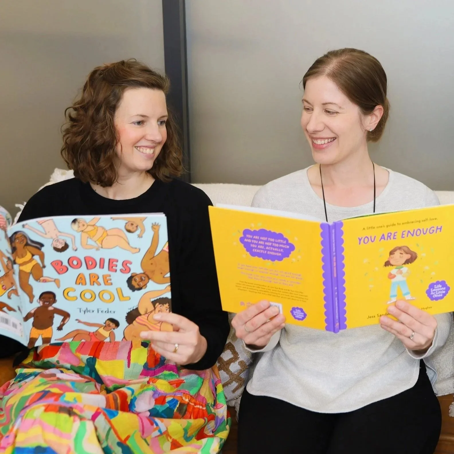 Dietitian's Georgia Rossetto and Jodie Spradbury reading body positive children's picture books