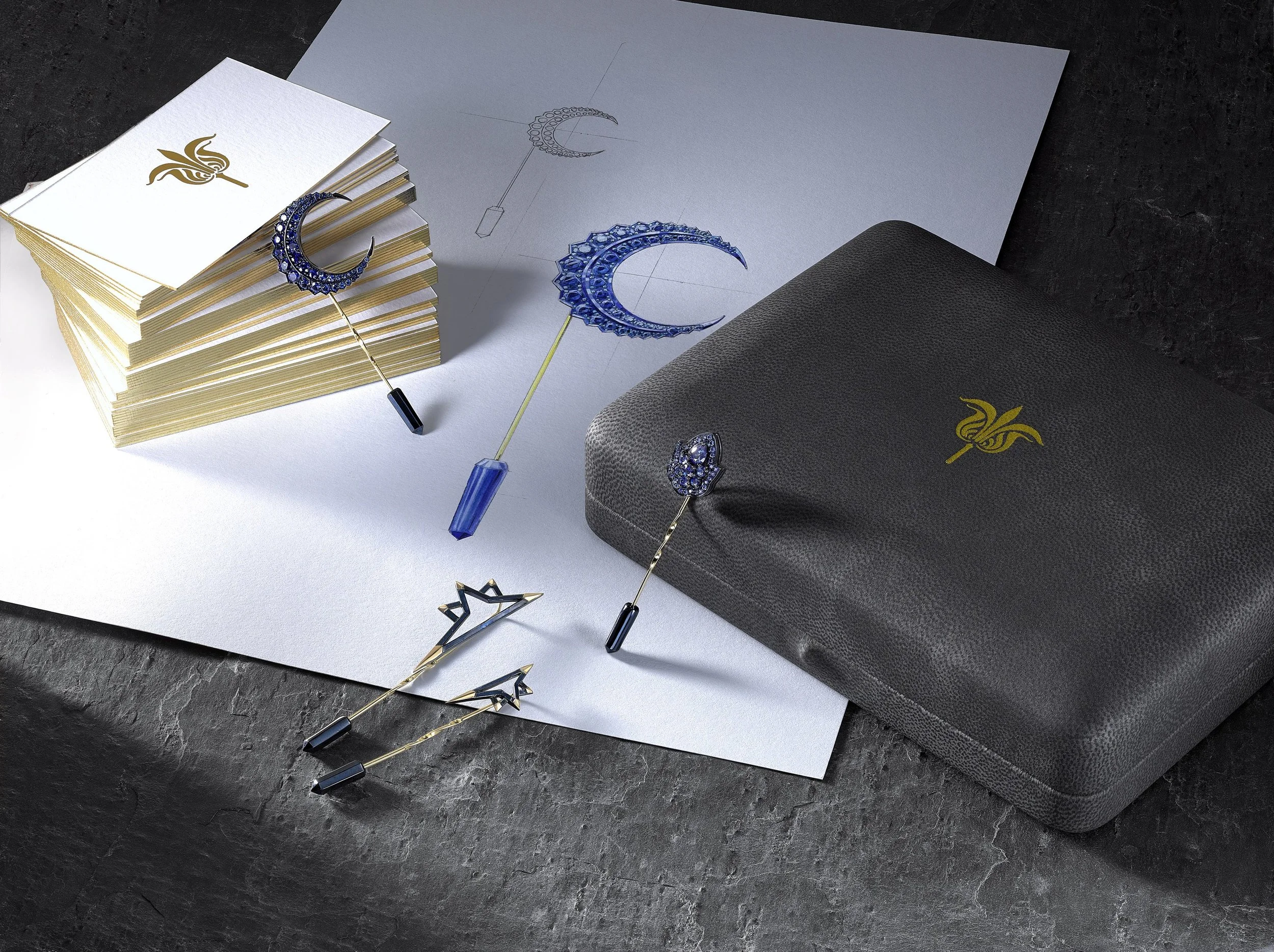 Rolls Royce sapphire lapel pins.jpg