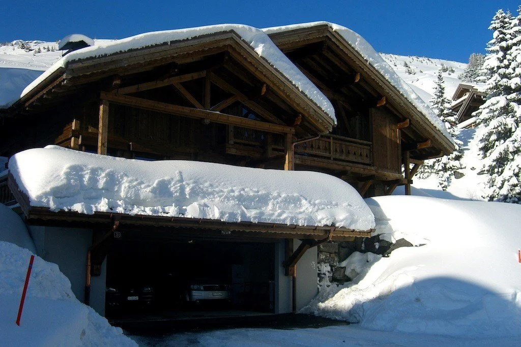 snow on chalet.jpg