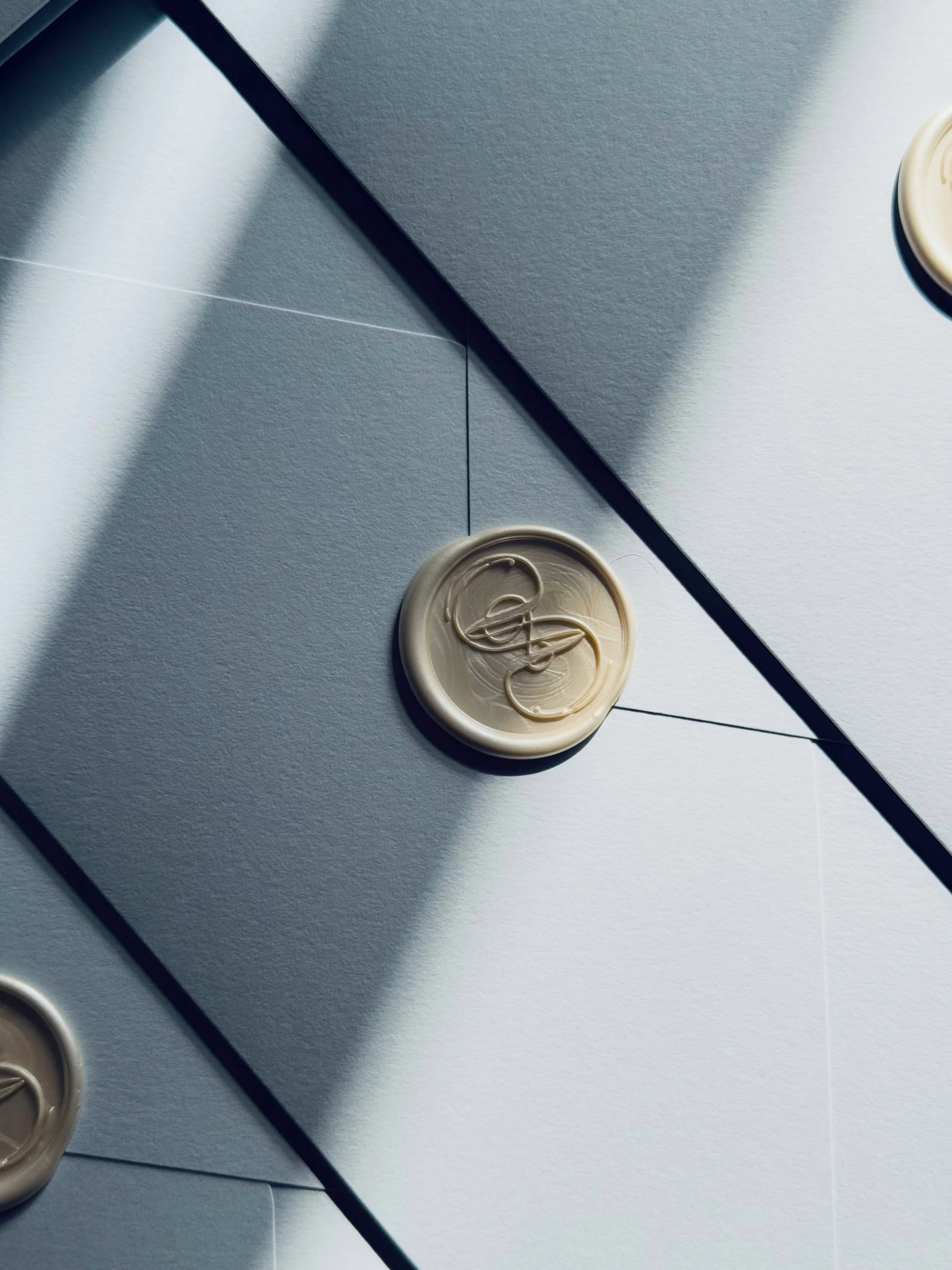 Summer production is in full swing. ✨

Each day, invitations are carefully assembled, wax sealed and prepared for their journey to guests around the world.

For V&amp;A&rsquo;s Italian wedding celebrations, crisp cool blue envelopes are finished with