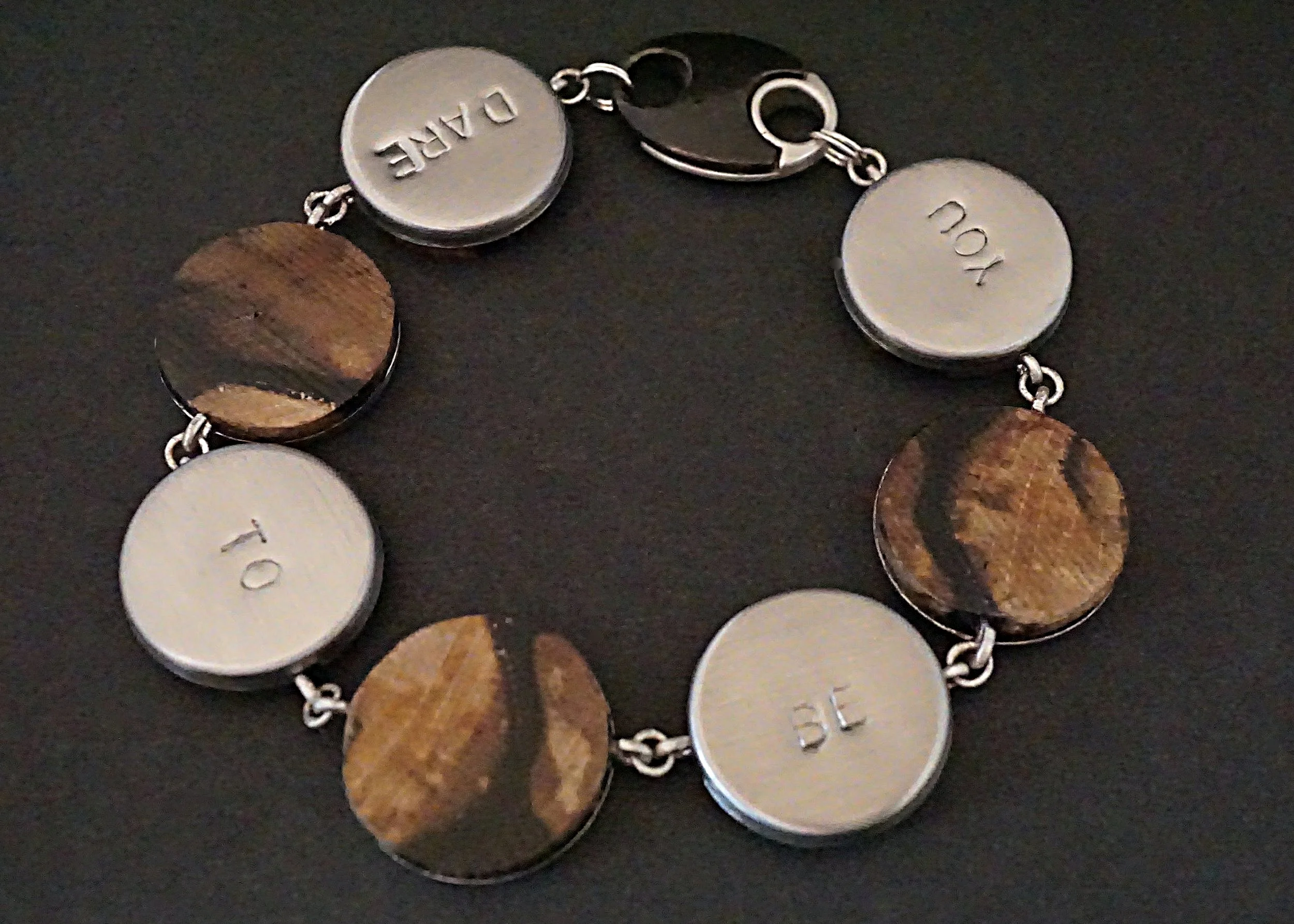 Hand carved black and white ebony wood links with stainless steel hand stamped tiles dare to be you with sterling silver magnetic clasp