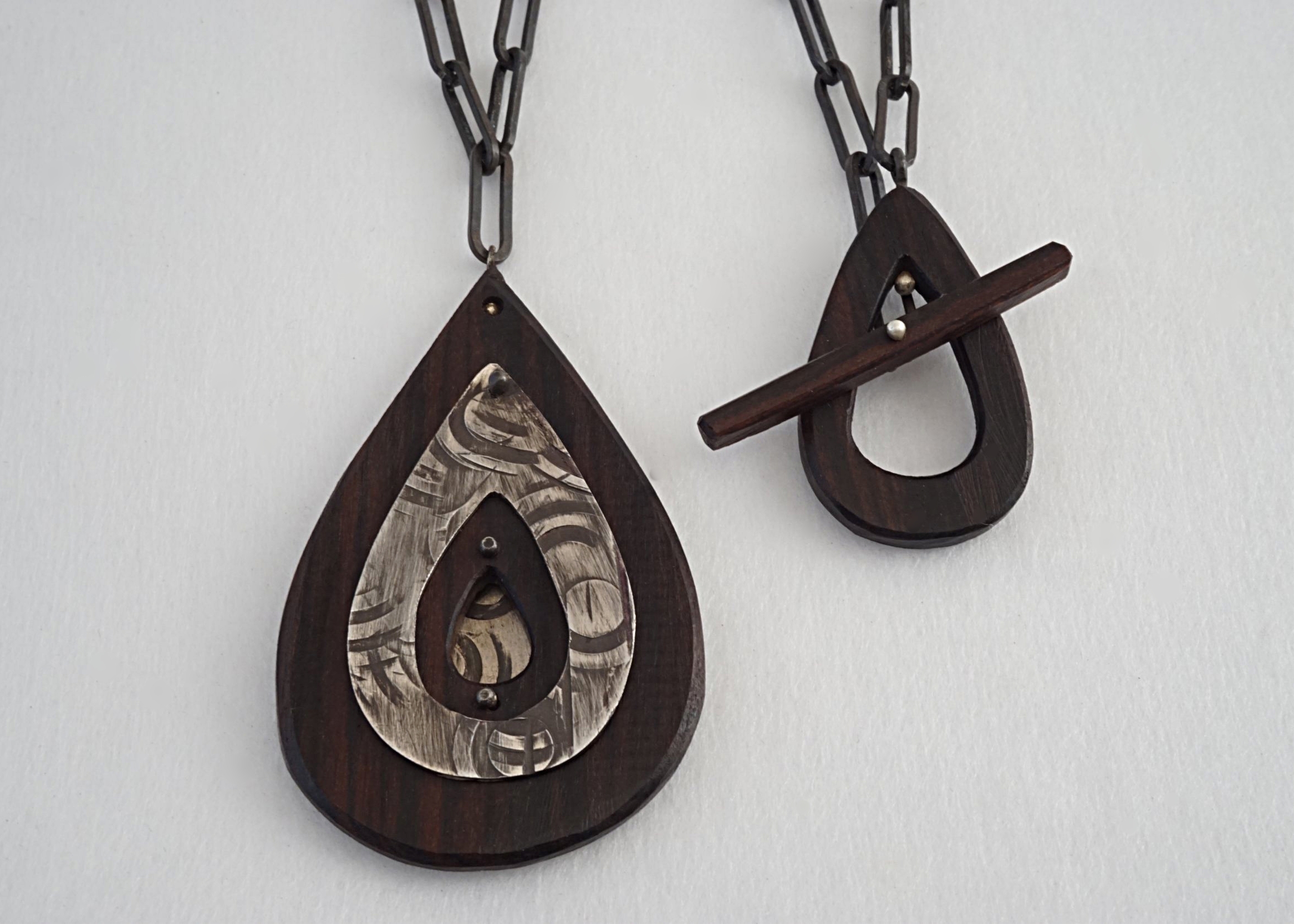 Bolivian rosewood pendant with hand stamped sterling silver