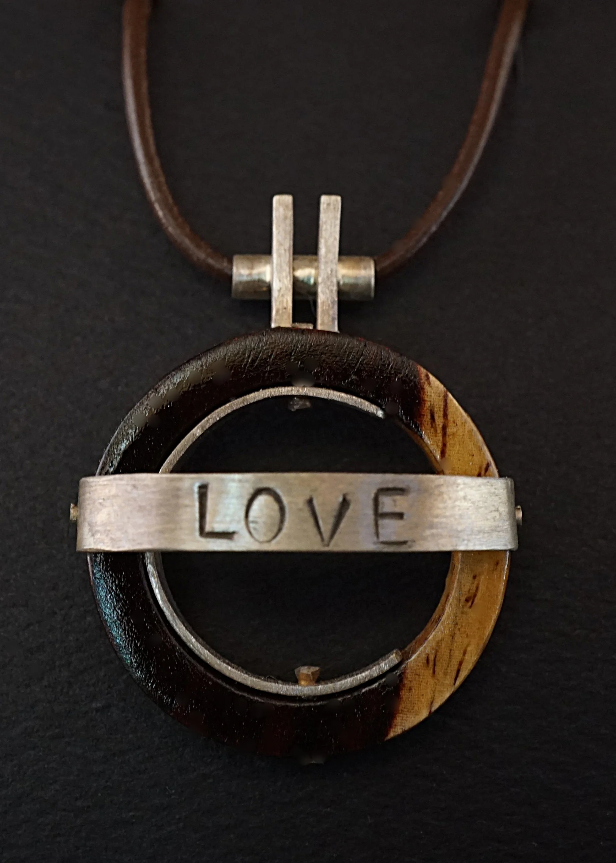 Cocobolo and Love stamped sterling silver pendant
