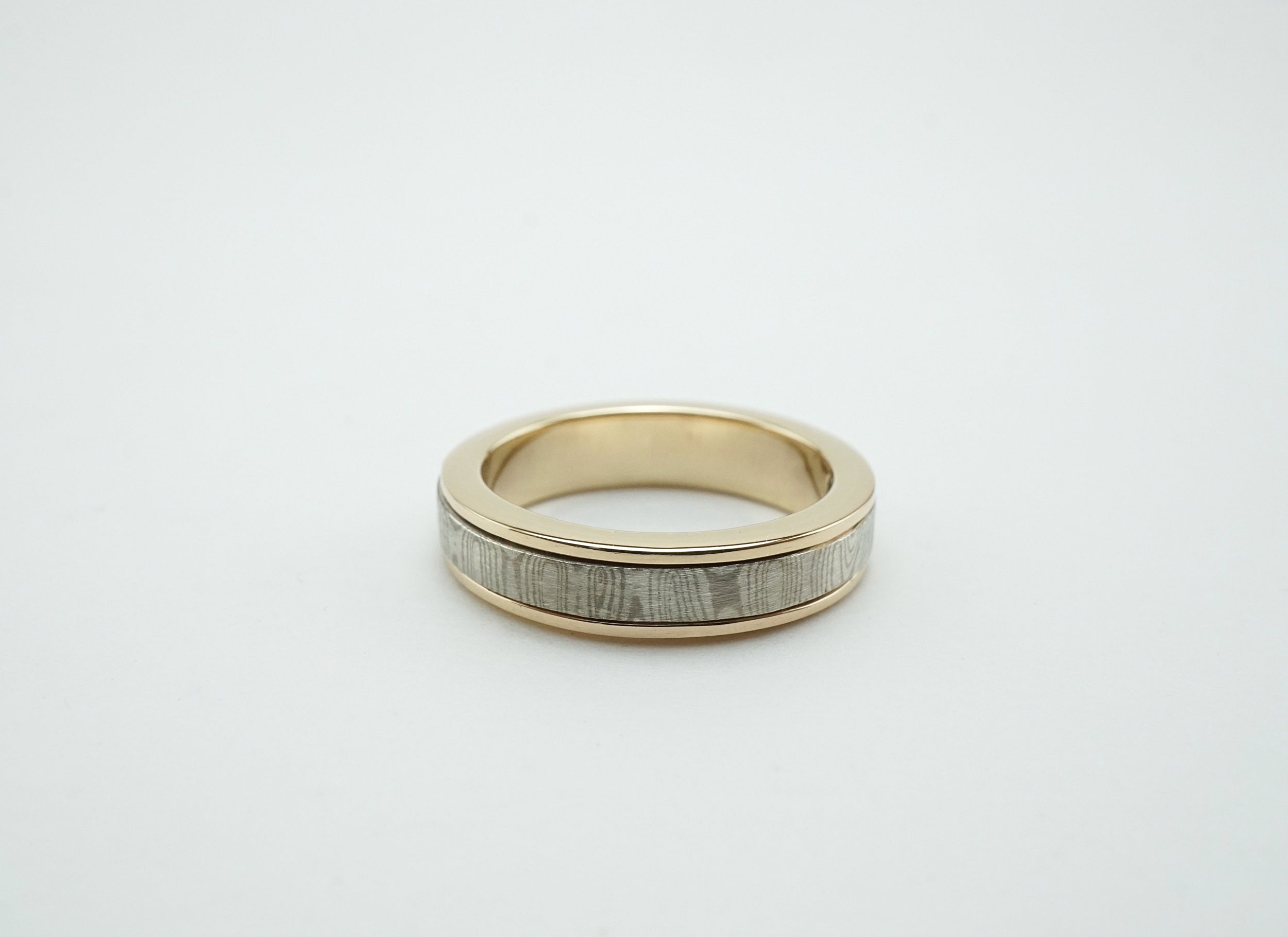 14k Mokume-gane spinner wedding ring