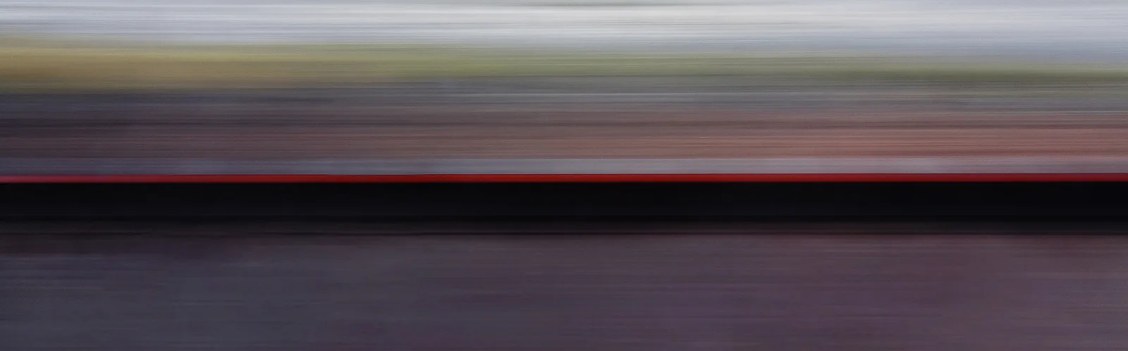 The Voyage Series This series represents an abstract departure into visualization of travel as it feels from the more personal view of one traveling, not only between the spheres of urbanity to more remote spaces, but also in a way that captures contemporary urban travel from one center to another. Being photographed on the surface of this earth, typically by train, the colors of the earth swirling past reflect the evolution and increase of the speed of travel, which has inexorably led to the urbanization of our world.
