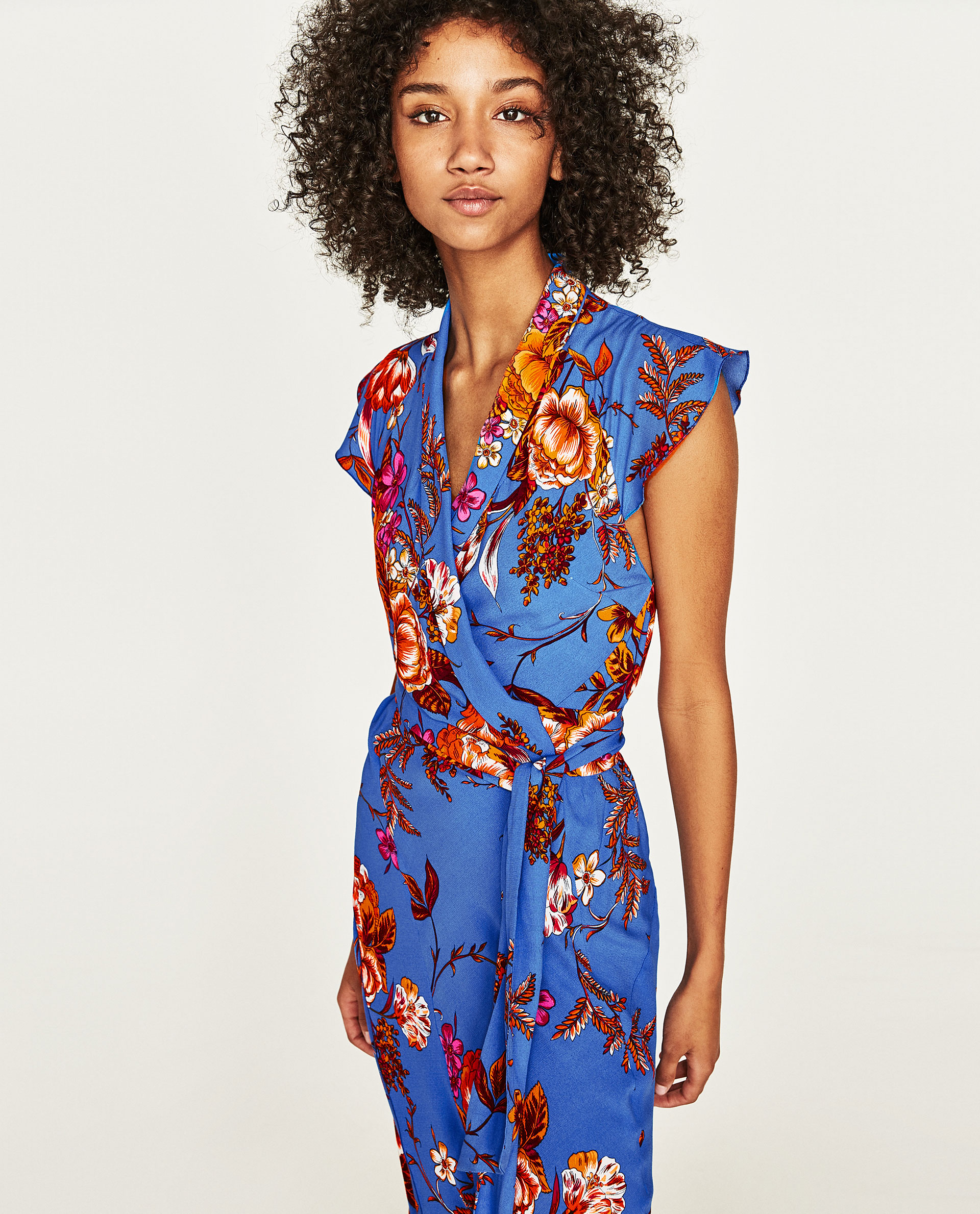 Zara £59.99 such an amazing colour, wear with flats or heels, depending on your wedding setting. You can pull out the red, pink, orange or do gold. Huge earrings and lots of bangles. 