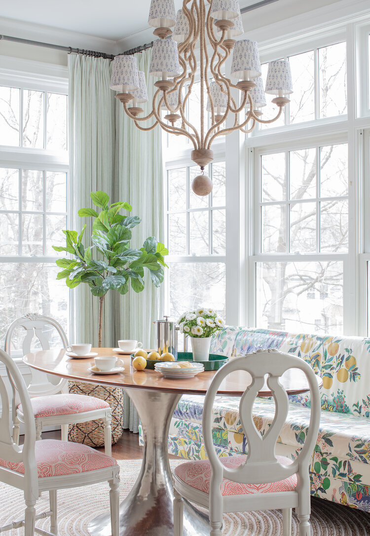 It's cold and blustery now (even though it felt like spring this past week too!), and this elegant breakfast nook reminds me that brighter days are coming. I added natural elements throughout the space, referencing the upholstery with fresh flowers a