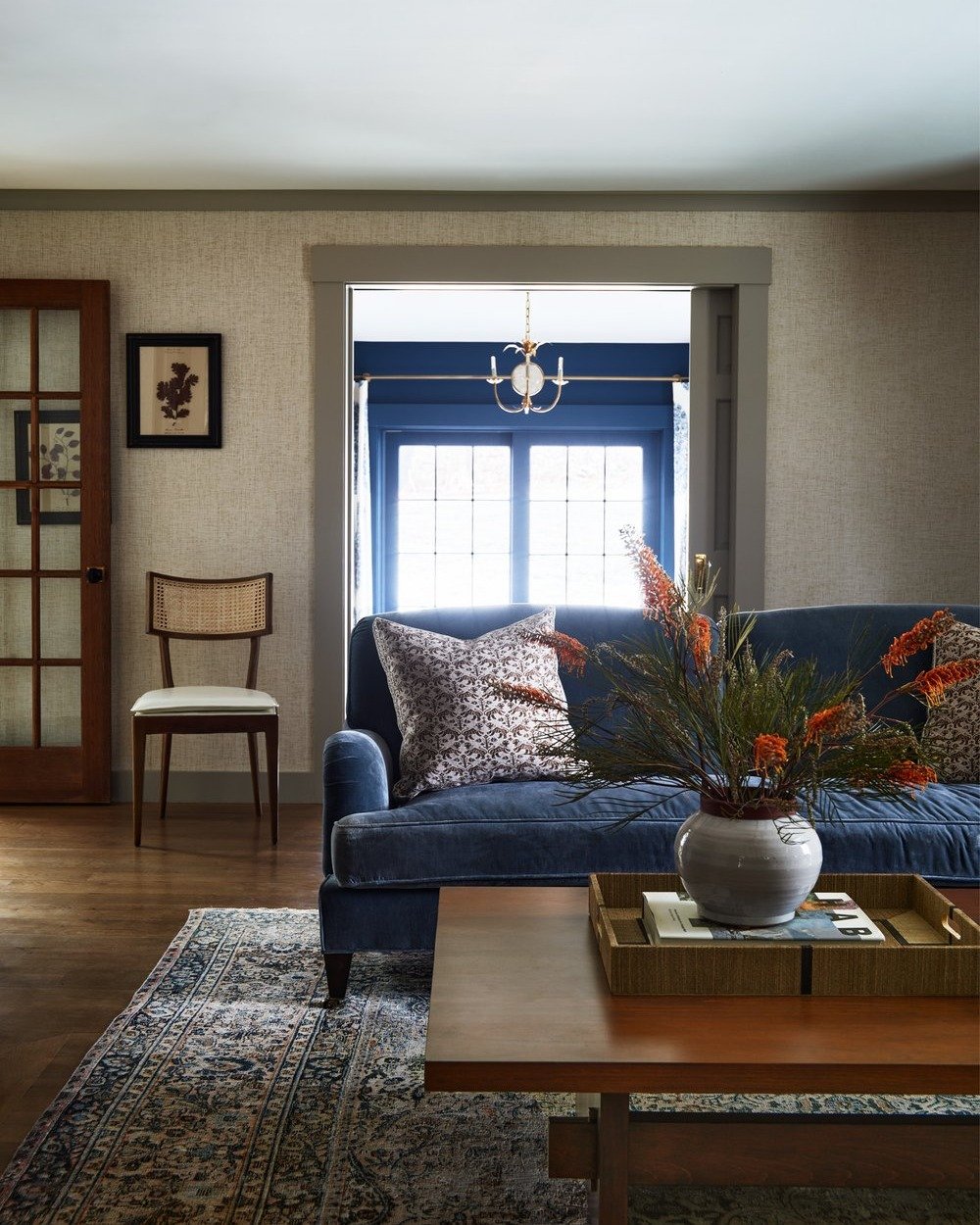 In the Dover Farmhouse project, I used rich blues against a more neutral background to uplift the overall aesthetic of this living space. Paired with colorful flowers, this room is made for cozy evenings or hosting for friends and family.

Photo: @ja