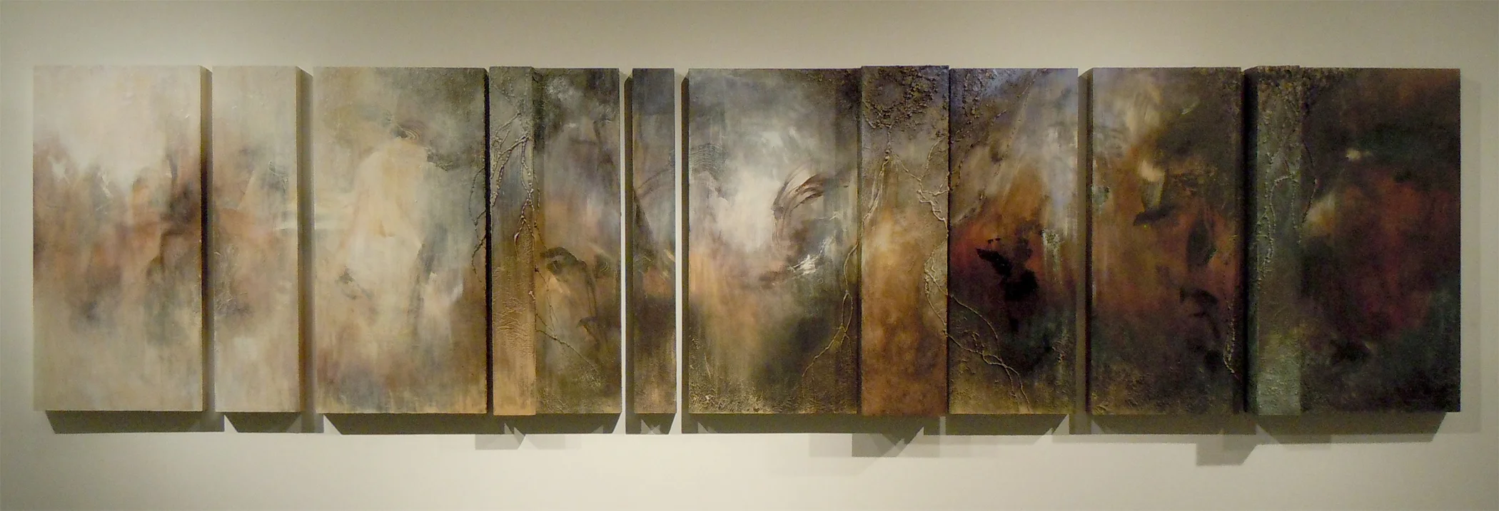 Progression: Onset , acrylic, dirt and polyurethane adhesive on wood, 48 x 201.75 inches, 2014.