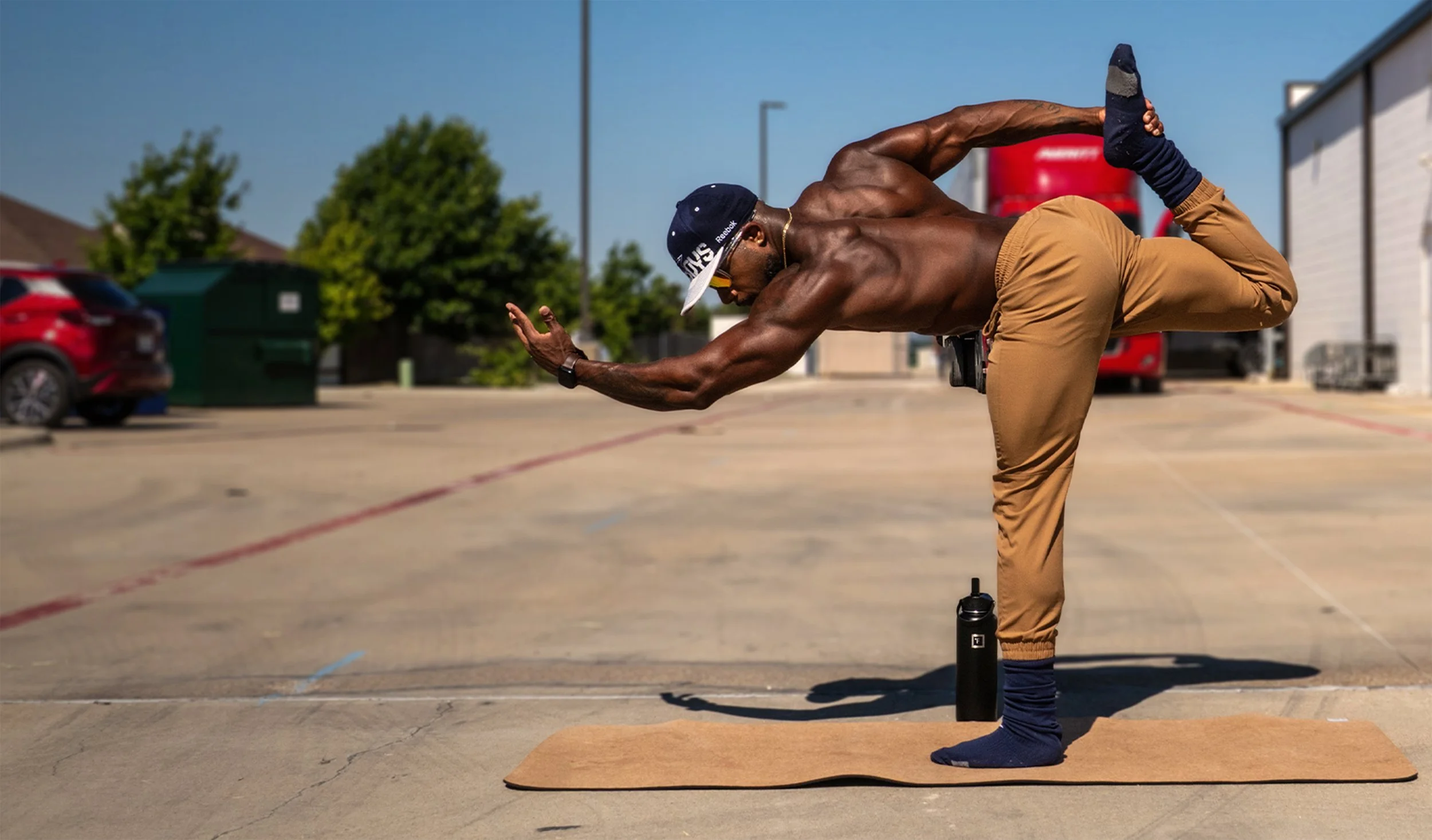 Bodybuilder doing yoga