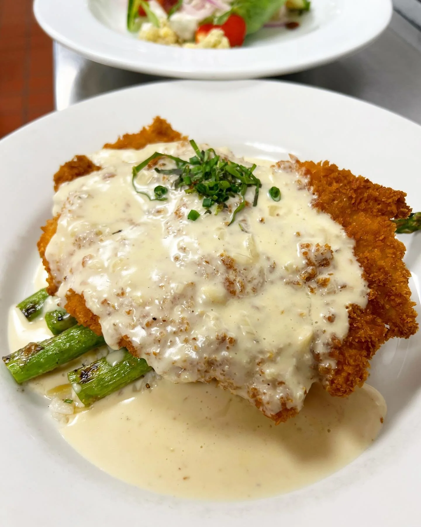 Here&rsquo;s a new one for us! Clancy&rsquo;s play on chicken cordon bleu! Chicken cutlet with prosciutto + Mornay sauce, served with rice pilaf + asparagus 

(I&rsquo;ve already heard 3 of our staff say they&rsquo;re getting it for dinner later afte