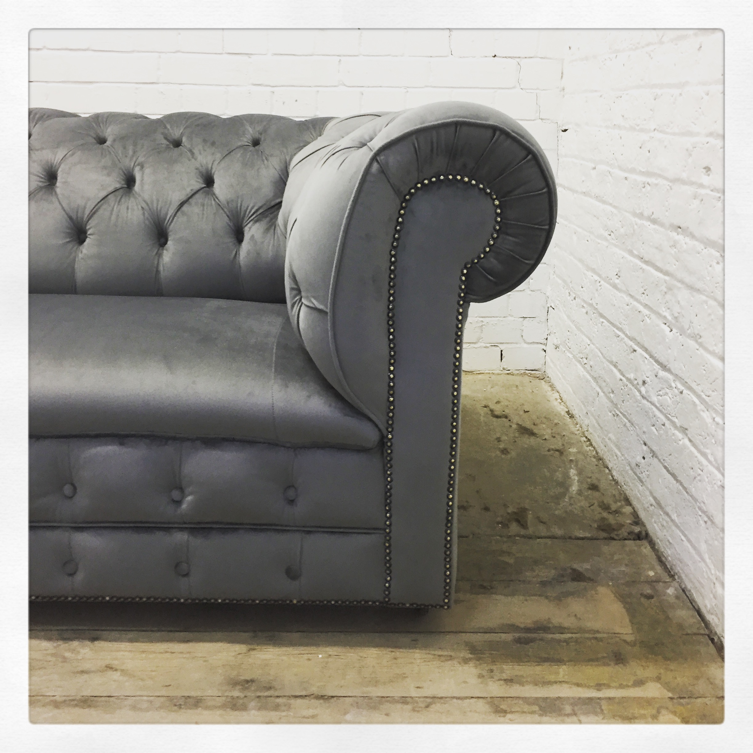 Reupholstered Deep Buttoned Sofa