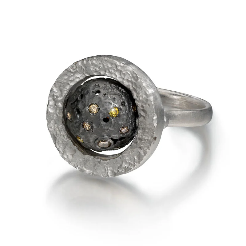 Silver and black rhodium rotating orb ring with diamonds