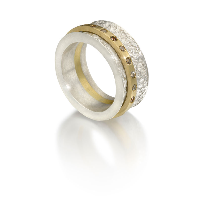 Etched silver outer ring, 18ct gold inner ring with cognac diamonds