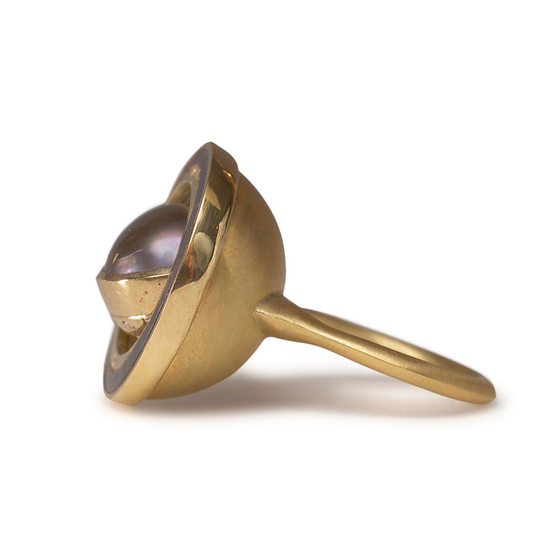 18ct gold engraved rotating armillary ring and oxidised silver 