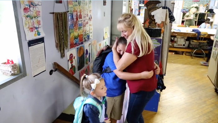 Kim, giving and receiving sugar from her kids.