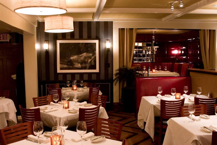 An interior photo of the Strip Steak dining room