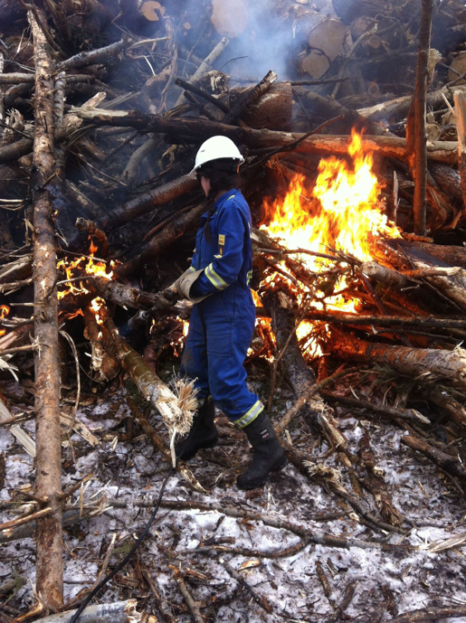 Me in coveralls using a tiger-torch to literally set the place on fire. Hilarious!