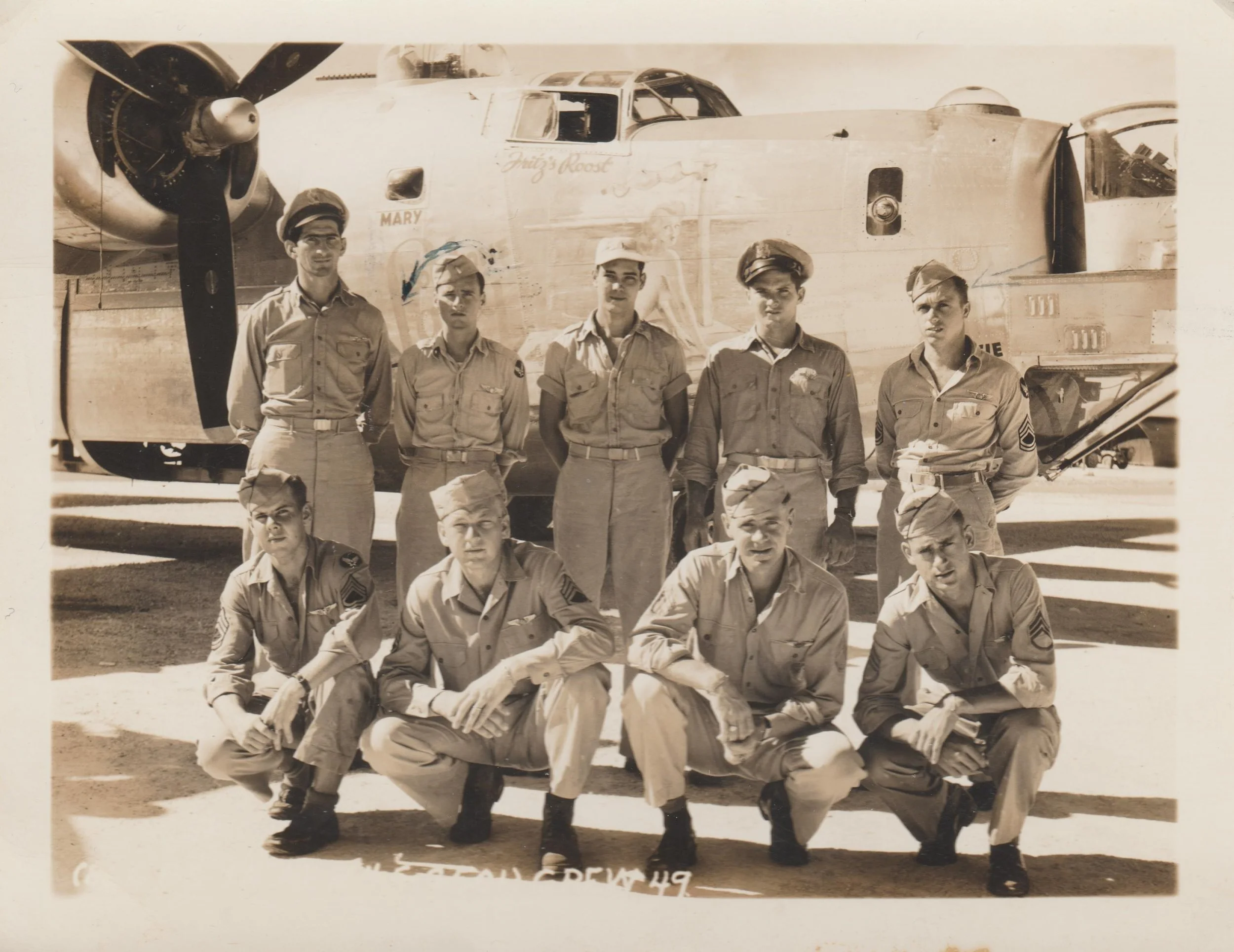 Joseph Dubinsky's veteran crew flew the Taloa on the Haruna mission, Group Mission #138. In this copy of the crew photo from the Co-pilot’s great-nephew, Michael Flanagin, the men of Crew #49 are posed in front of the nose art of the Lonesome Lady . (left to right) Standing: 1st Lt. Joseph Dubinsky (Pilot); 2nd Lt. Rudolph C. Flanagin (Co-pilot); 2nd Lt. Lawrence A. Falls, Jr. (Navigator); 2nd Lt. Robert C. Johnston (Bombardier); T/Sgt Walter Piskor (Engineer) Kneeling: David. A Bushfield (Radio operator); Camilous P. Kirkpatrick (Waist Gunner); Charles C. Baumgartner (Lower Ball Turret Gunner); Charles C. Allison (Upper Turret Gunner); Not pictured: Julius Molnar (Tail Gunner). Not pictured here was Capt. Donald Marvin, an observer on his 40th combat mission who piloted most of the Taloa missions.