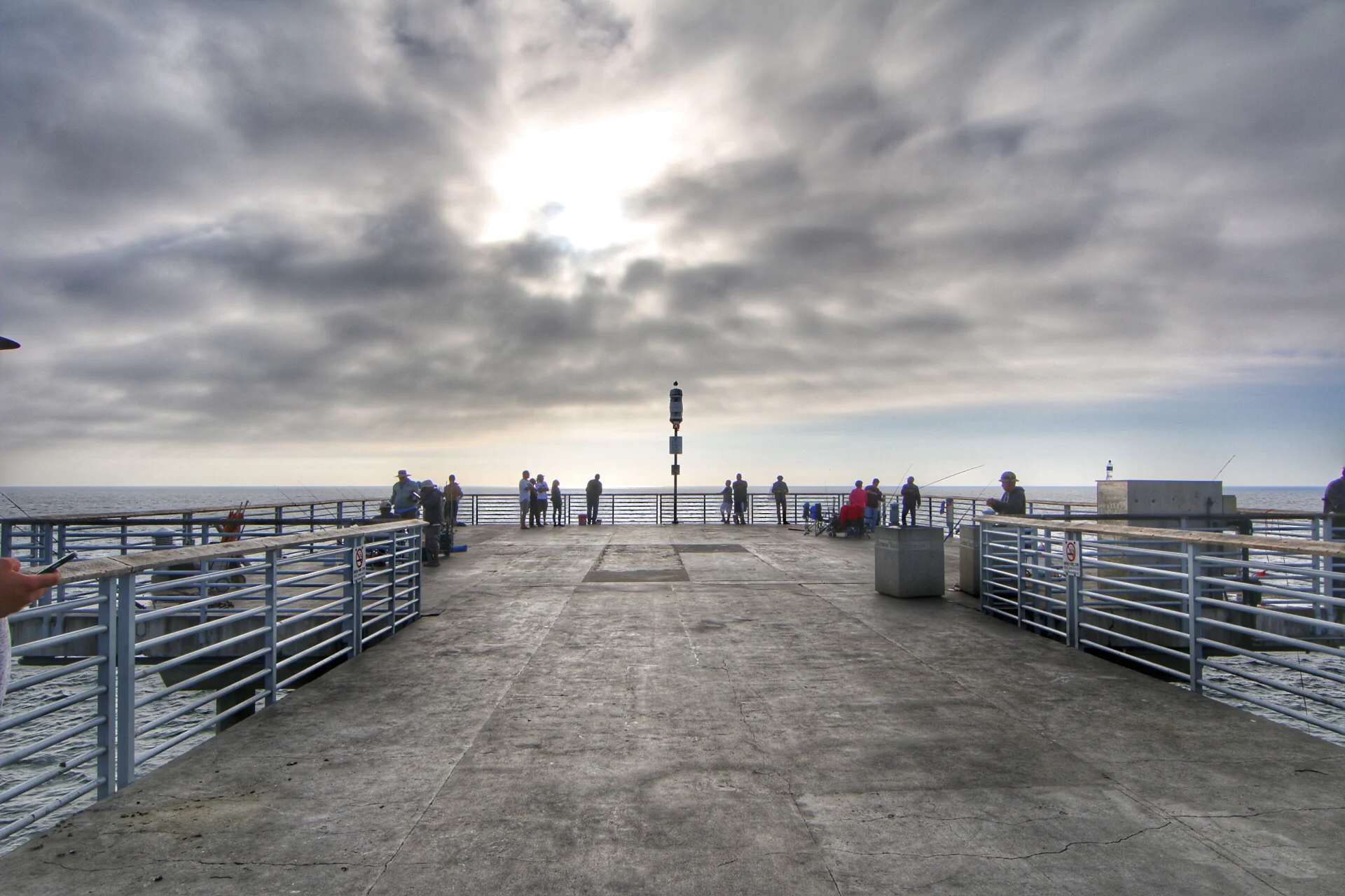 Clouds make an otherwise ordinary photo of people fishing off the Hermosa Beach pier, come to life. 