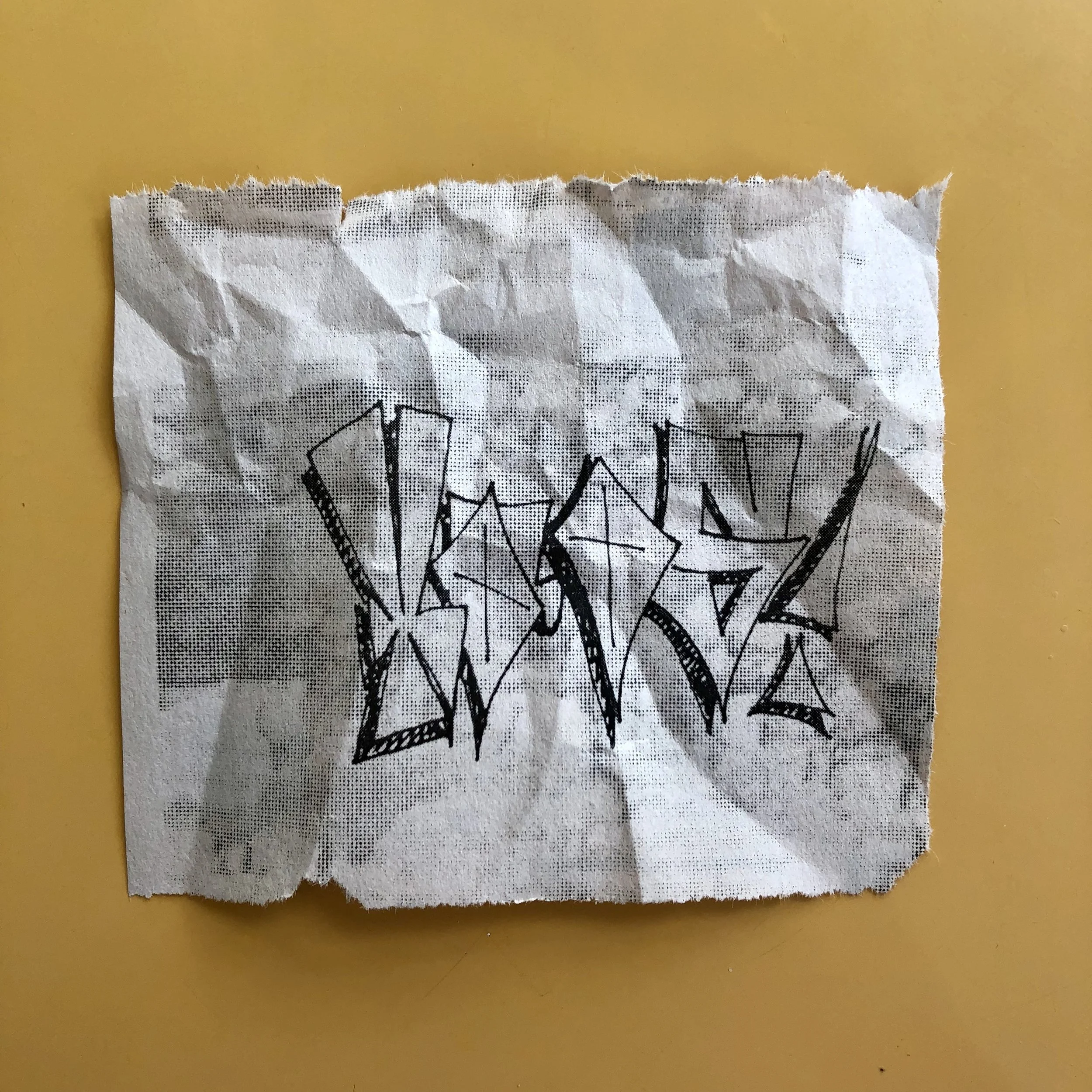 This issue, the “feelie” is the scrap of paper Richard draws Tinas tag on, from the back of Billys car.