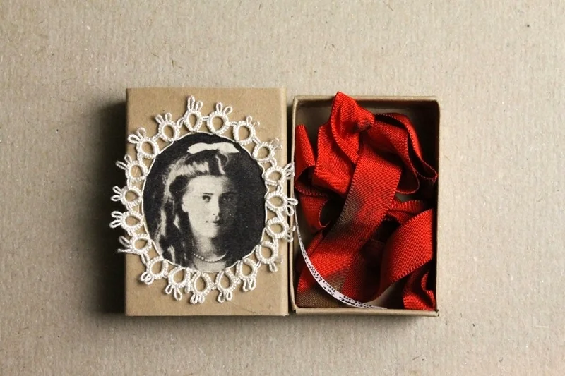b1-matchbox-art-2011-10-red-ribbon-2.jpg