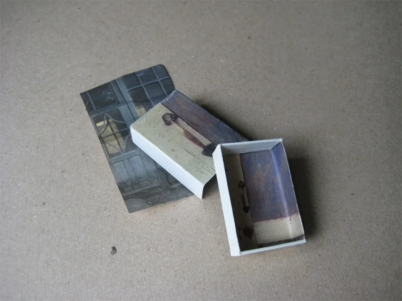 x9-matchbox-art-faces-15.jpg
