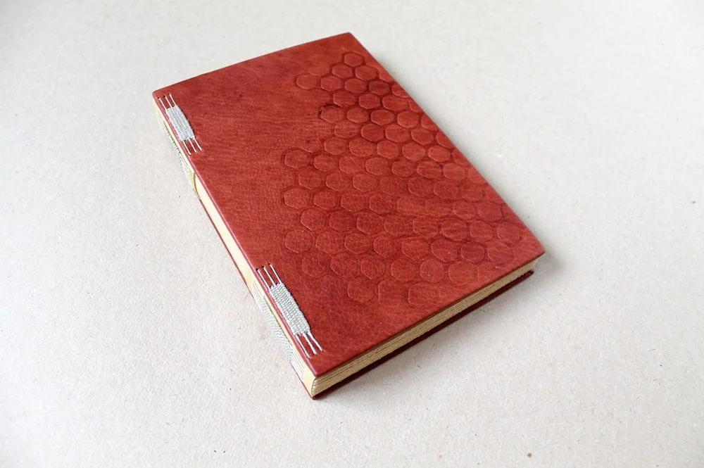 z3-woven-long-stitch-binding-leather-hexagons-1.JPG