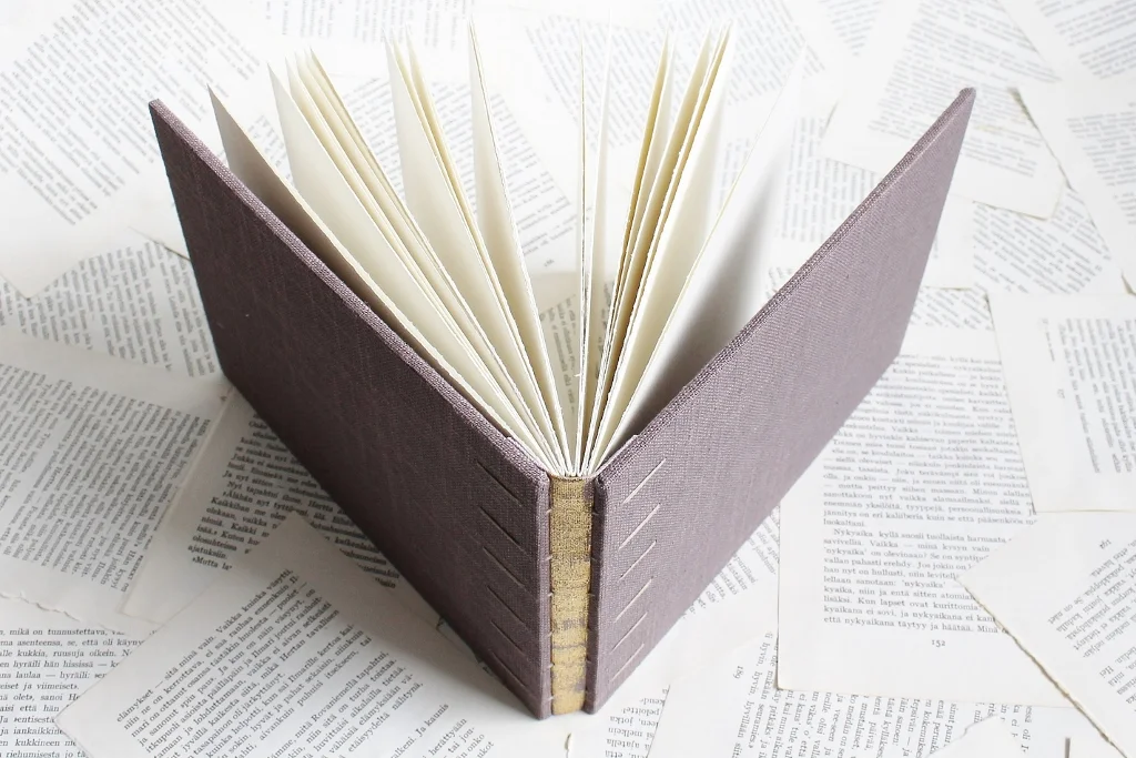 y6-coptic-bound-guestbook-gold-spine-light-purple-3.jpg