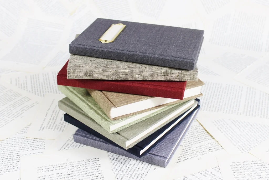 z9-stack-of-linen-notebooks.jpg