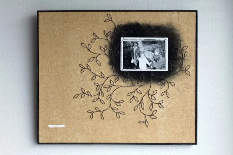   sch..., 2015    (vintage photo [a vintage reproduction of a cut up photo], vintage book page, tissue paper, linen fabric, embroidery thread, pencil, acrylic paint, paper, board, twine, paste, glue)    30,5×25,7×1,5cm/&nbsp; 12″x10.1″x0.6″  