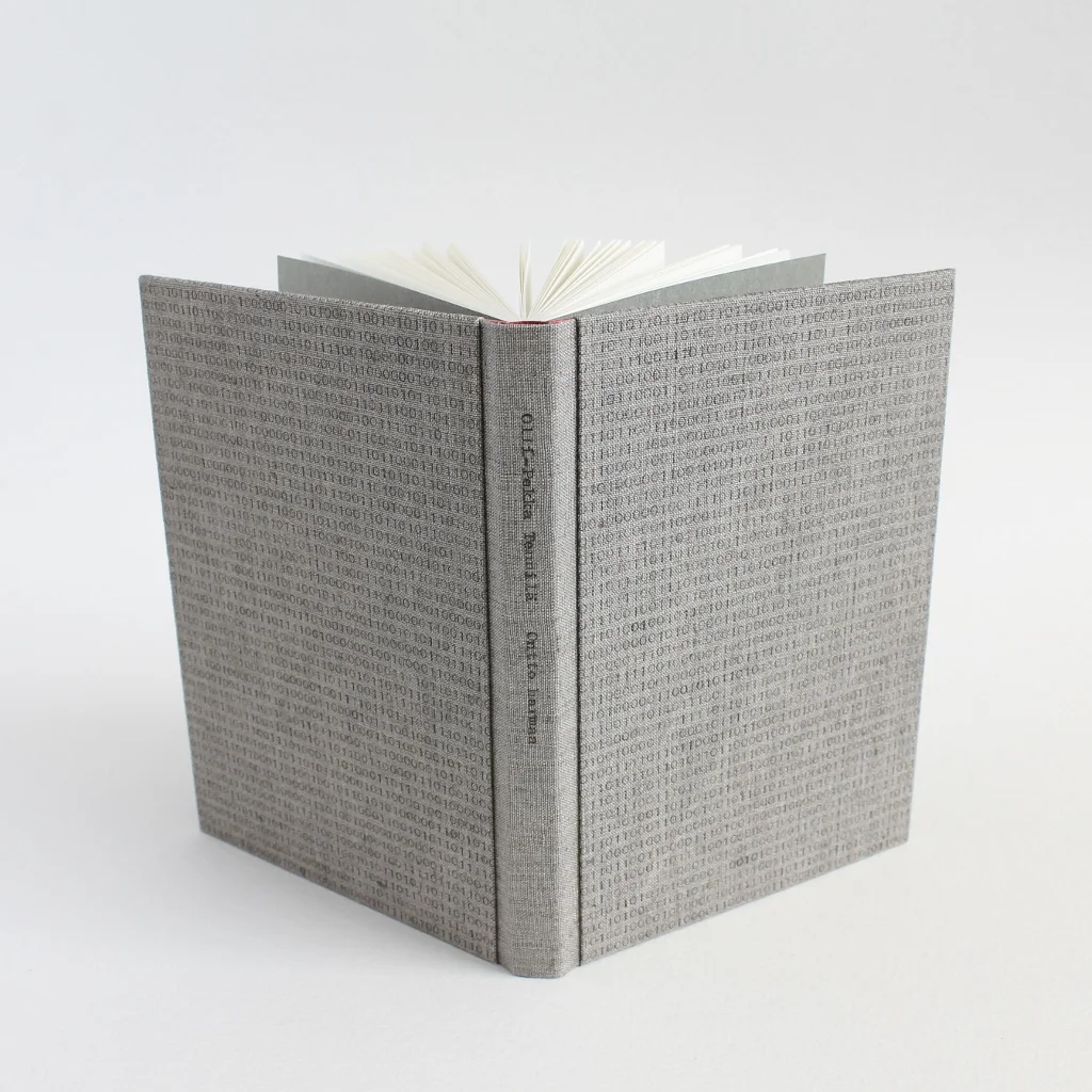fine binding by Kaija Rantakari, 2017 Ontto harmaa by Olli-Pekka Tennilä (Poesia, 2016) sewn boards binding with linen covers and typewritten binary code