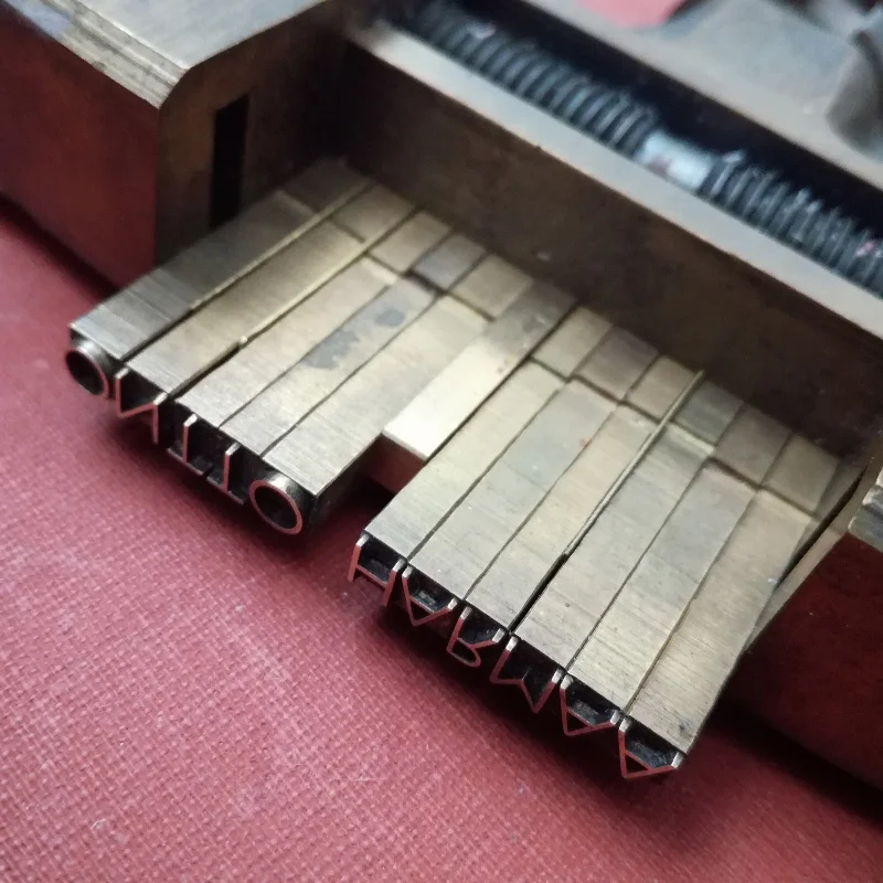getting ready to tool the title - fine binding - work in progress by Kaija Rantakari / www.paperiaarre.com