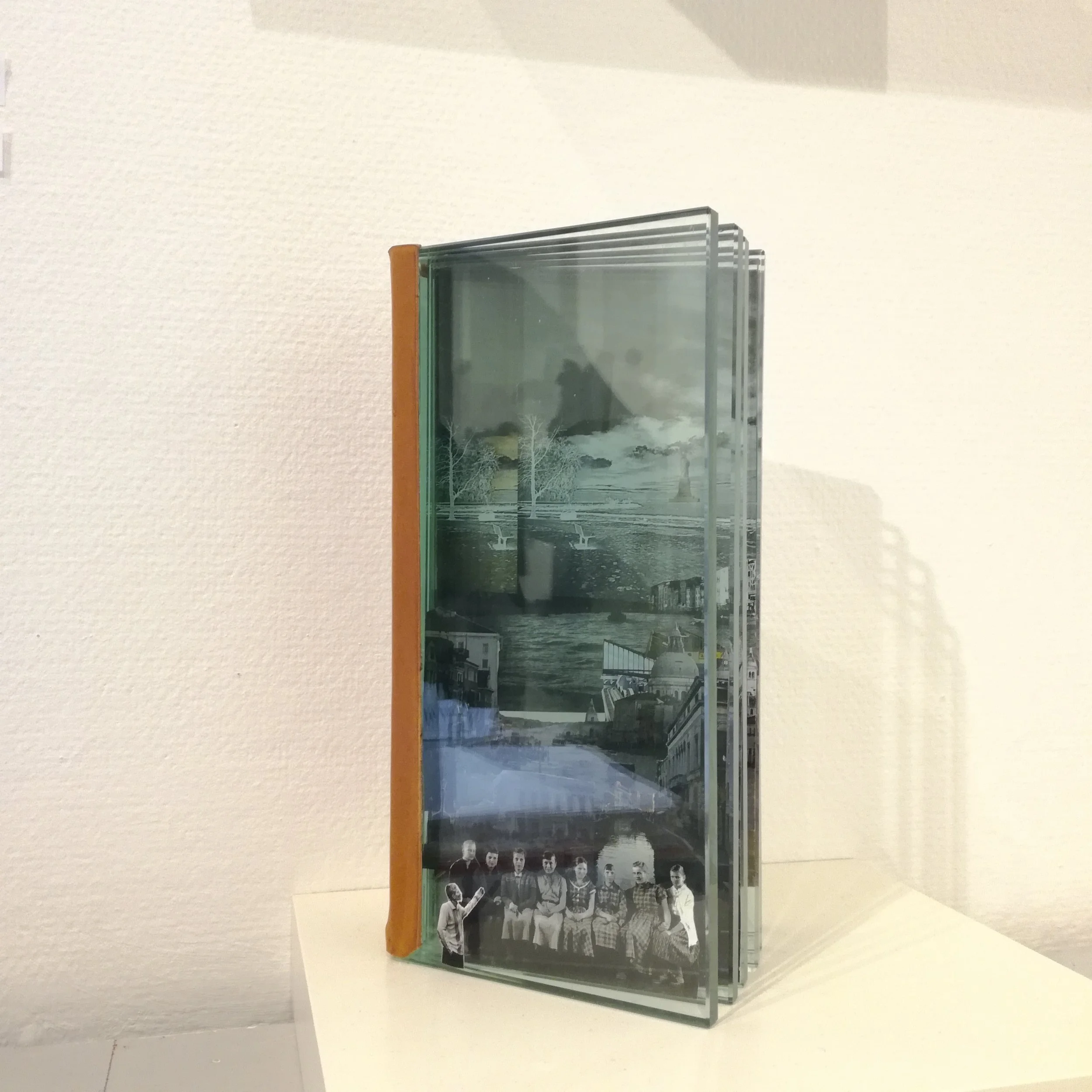 Taiteilijasukupolvi, 2017, by Rauni Hulke glass, paper, glue, oil paint - 26x14x6cm