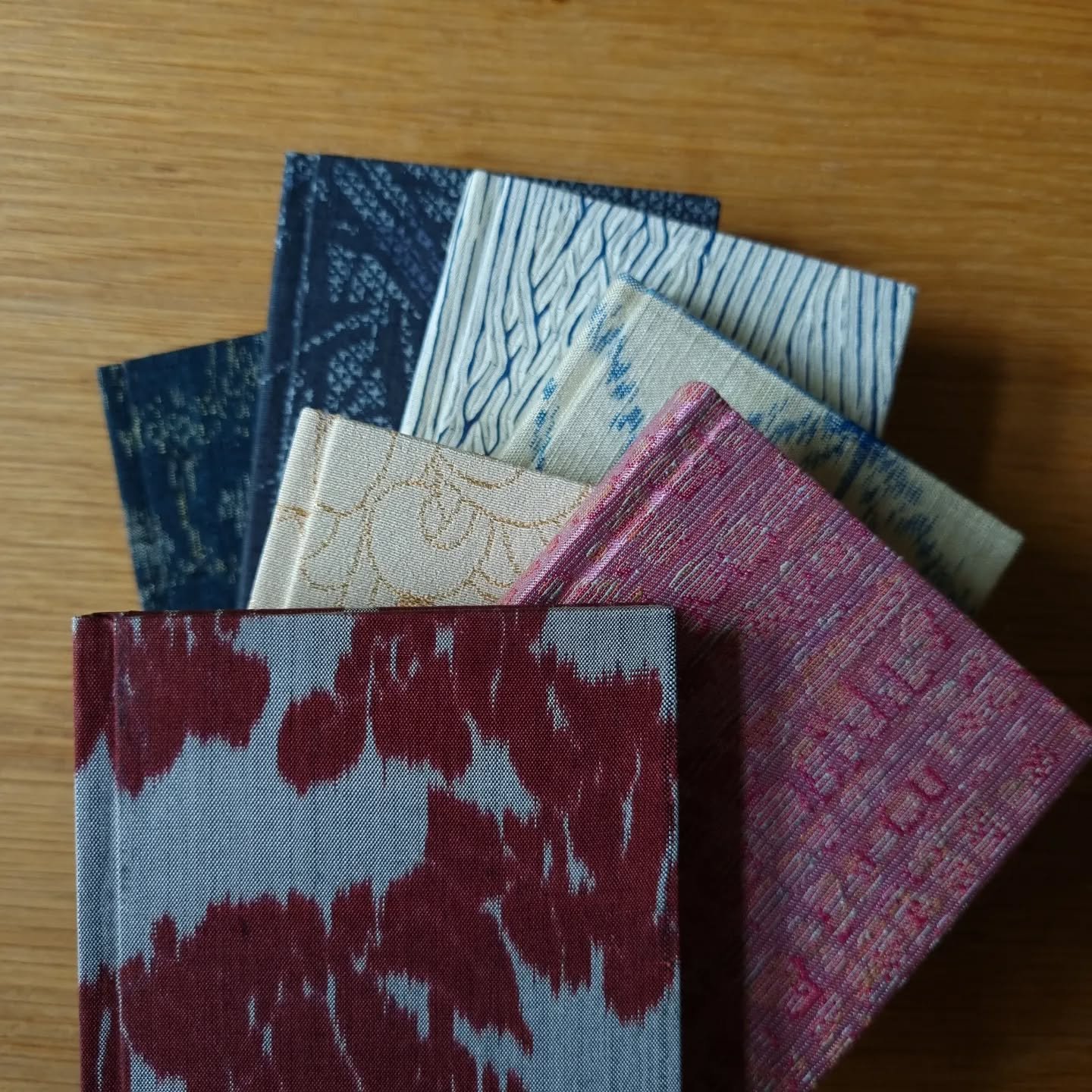 New blog post and new books now available in the Paperiaarre shop at www.paperiaarre.com. There's postcard-sized watercolor journals perfect for travel journal use, too, and a small lot of the popular adorably tiny notebooks. All covered with repurpo