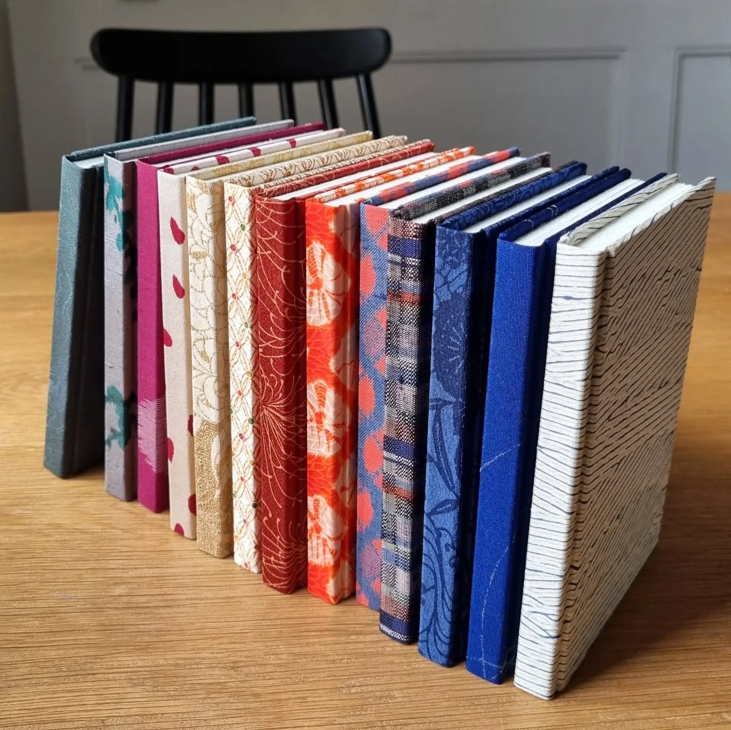 Fresh out of the press. It's incredibly satisfying to hold a big stack of notebooks you just finished.

These beauties will be available at @galleriakuvitus later this month ❤️