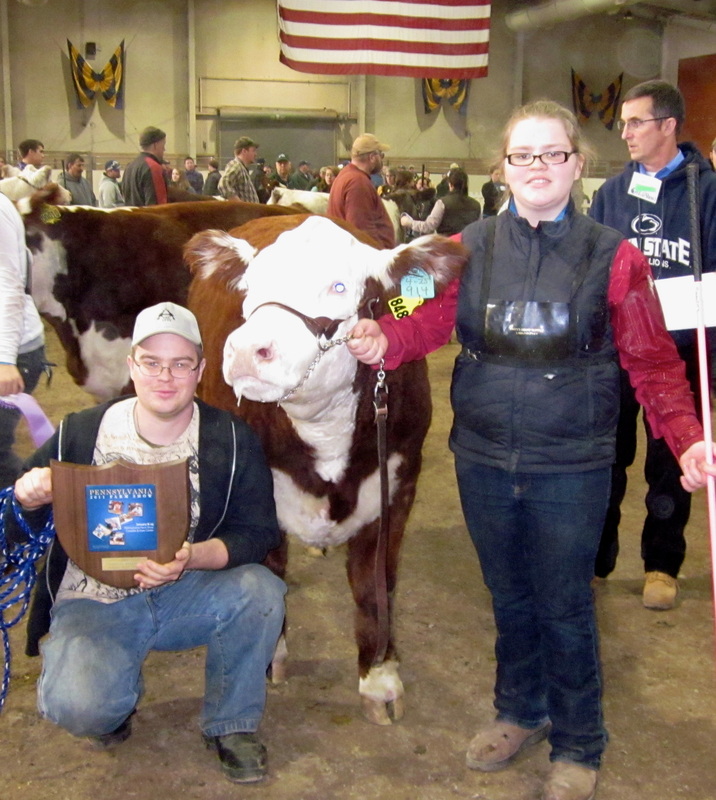 George IV and Emily at 2011 PA Farm Show after winning Champion Hereford Steer