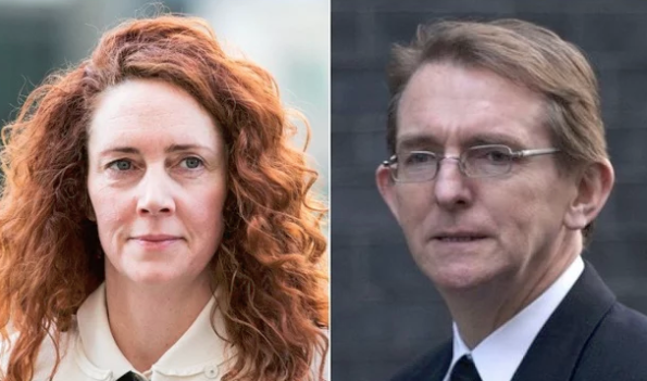 Ignorance: Gallagher, right, told boss Brooks, left, he had not seen controversial 'racist' column