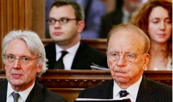 Rupert Murdoch sits alongside Les Hinton. Andy Coulson and Rebekah Brooks look on. Picture: Getty