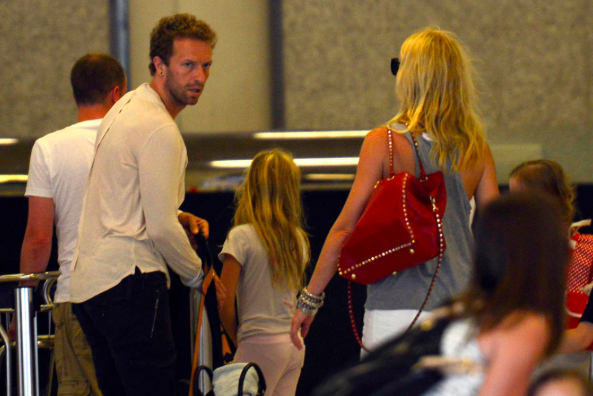 Chris Martin (l) and Gwyneth Paltrow (c) PA