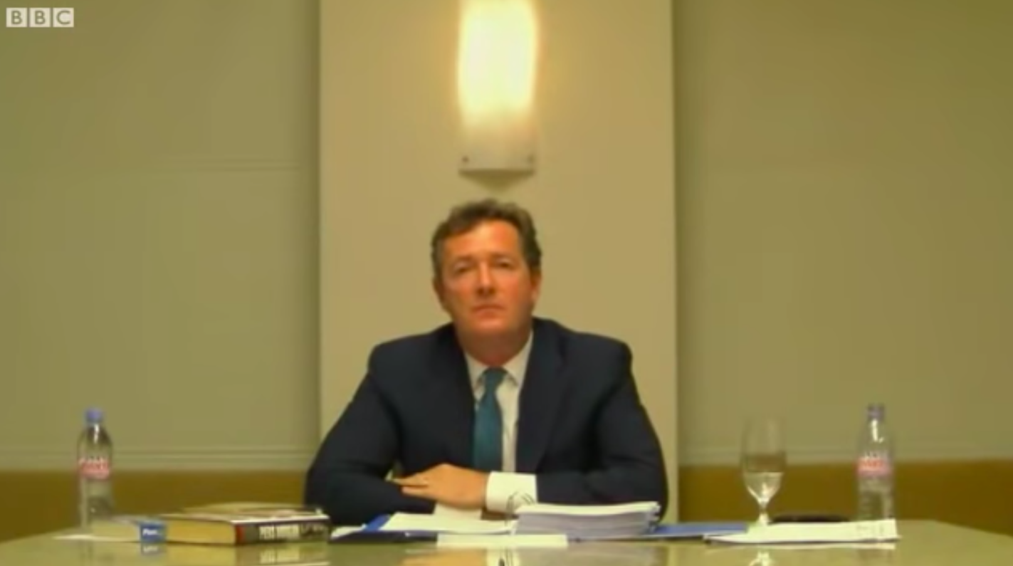 Under oath: Piers Morgan being questioned by video link at the Leveson Inquiry in 2011 where he denied knowing about phone hacking