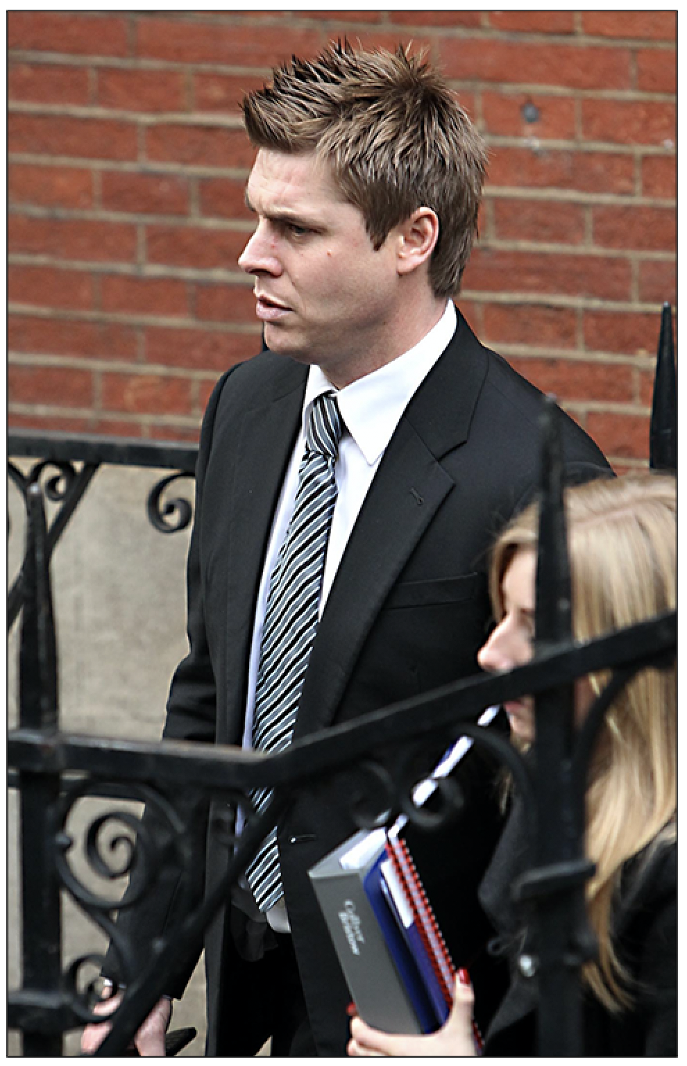 Garry Flitcroft leaves after he gave evidence to the Leveson Inquiry at The Royal Courts of Justice, The Strand, London, on 22 November 2011